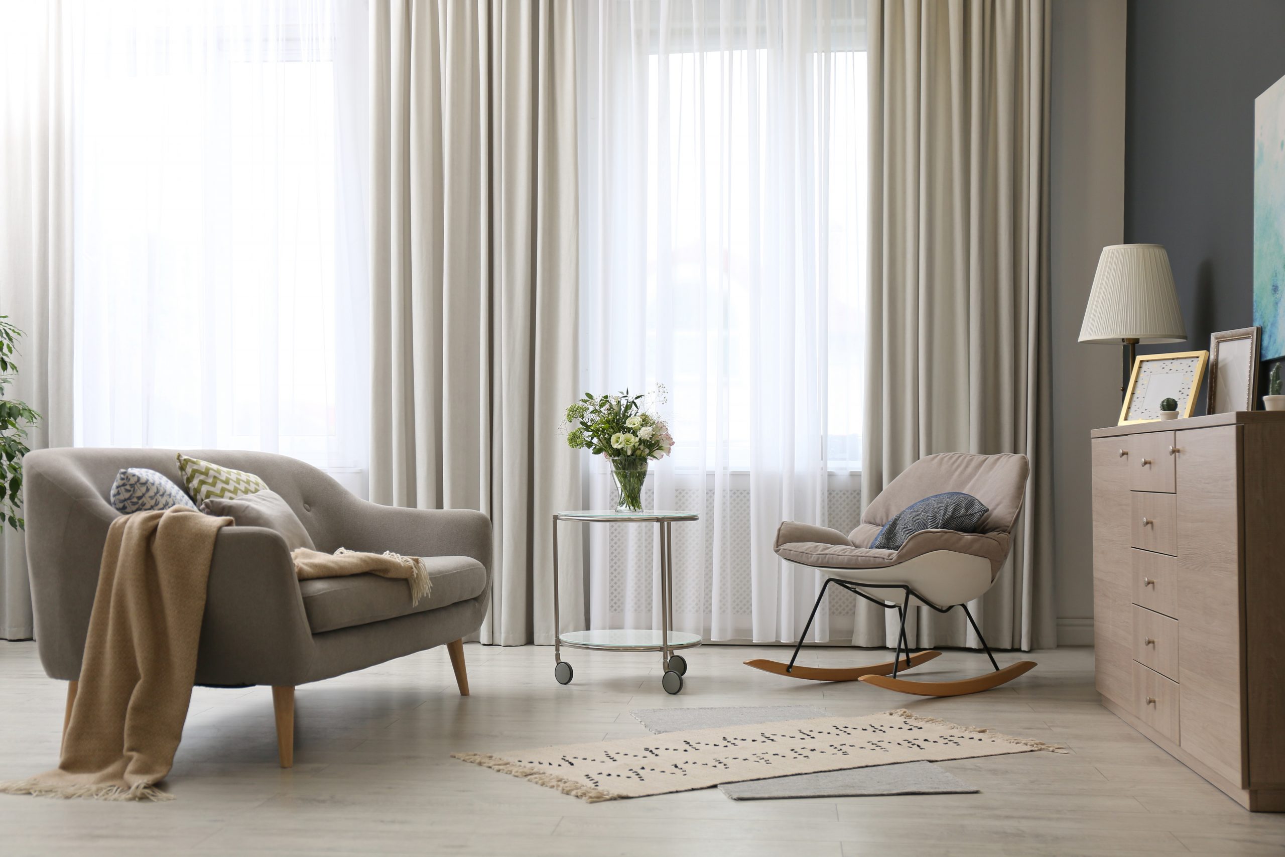 Modern living room interior with beautiful curtains on window